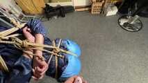 Lena buttplugged, bound and gagged in shiny Shorts and Windbreaker