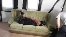 Jasmin hogtied on couch 1/2