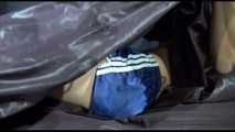 Sexy SANDRA wearing ONLY a sexy shiny nylon shorts posing and lolling in a shiny nylon cloth on a bed (Video)