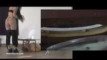 Mistress Cleo squirts cologne into the mouth of the slave lying in the toilet. Picture in Picture