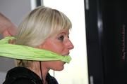 Pia tied and gagged in shiny nylon shorts