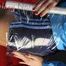 Watching sexy Pia being envelopped in film wearing a sexy blue shiny nylon shorts and a lightblue shiny nylon rainjacket (Pics)