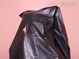 [From archive] Liska overhead trash bag packed with red duct tape