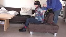 Susan roped on couch 1/2