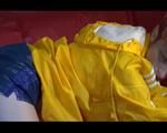 Sonja preparing her sofa with a special shiny nylon cloth wearing a supersexy selfmade shiny nylon shorts in darkblue/purple and a yellow rain jacket (Video)