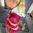 Alice bound and gagged in a nylon Rainsuit