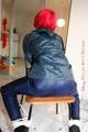 Marlin tied and gagged in a shiny blue rainsuit