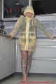 Miss Francine in yellow Schmuddelwedda raincoat