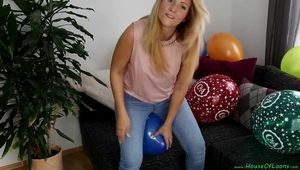 sitpopping promotional balloons on the couch