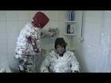Get 2 Videos with Dani bound and gagged in shiny nylon Downwear from 2008.