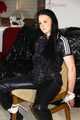 Lucy tied and gagged with rope and gag on a chair wearing a sexy black shiny nylon jumpsuit (Pics) 