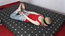 Sarah hogtied with hand and feet cuffs get tickled