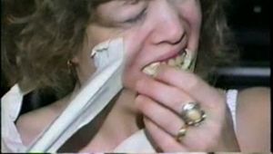 25 YR OLD CHARLENE IS WRAP GAGGED & CHAIR TIED TO A CHAIR WITH WHITE CLOTH MEDICAL TAPE (D47-14)