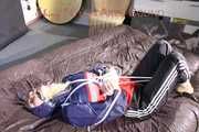 SANDRA tied, gagged and hooded with ropes on a bed wearing a supersexy oldschool rain jacket and a shiny nylon rain pants (Pics)