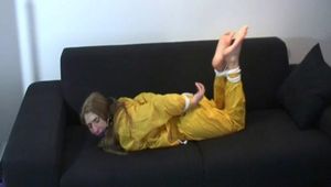 two short videos with our archive girls tid and gagged in shiny nylon rainwear