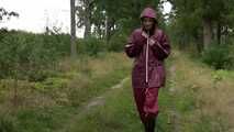 Miss Petra takes a walk in an AGU rain suit and rubber boots (looped version)