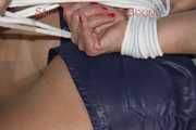 Watching Pia being tied and gagged on a sofa wearing a sexy shiny nylon shorts and a tshirt (Pics)