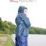 Sexy archive girl wearing a blue rain pant and rain jacket walking on a lake in freetime (Pics)