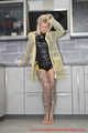 Miss Francine in yellow Schmuddelwedda raincoat
