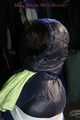 Sexy Mara wearing a black rain pants and a blue/black down jacket being tied, gagged and hooded with tape and clothgag (Pics)