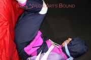 Watching Pia wearing blue/pink shiny nylon rainwear being tied and gagged and hooded with tape and a clothgag (Pics)