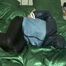 0055 min video with an beautiful archive girl in blue rainwear double hooded, tied and gagged in bed