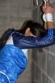 Alina tied and gagged in shiny nylon clothes