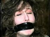 ERICA IS MOUTH STUFFED, WRAP TAPE GAGGED & BALL-TIED (D29-8)