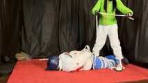 Sebastien breathplay in 2 down jackets is hanging tied the in a hogtie.