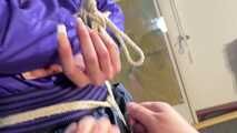 Myxxxy tied and gagged in shiny nylon Shorts and Windbreaker