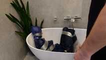 Myxxxy surprised by an Intruder in her Bathroom finally bound and gagged in Rainwear