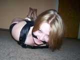 Sandra cuffed and roped