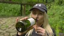 Vanessa is drinking in a hut