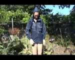 Mara wearing only a hot rain jacket and rubber boots lingering in the garden taking a shower (Video)