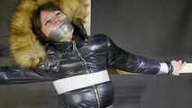 Lana tied and gagged in a shiny nylon Downjacket