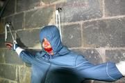 Alina tied and gagged in a skisuit