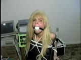 GREEN EYED, BLOND BOMBSHELL, CROTCH ROPED & BALL-GAGGED (D20-14)
