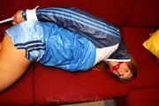 Katharina bound and gagged in shiny nylon shorts