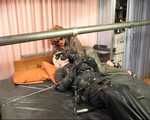 Latex Doll bound in a rubber bag