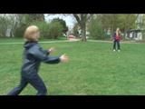 Katharina and her friend wearing shiny nylon rainwear while playing soccer (Video)