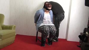 Lily tied on chair 1/2