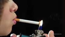 A young lady showing her smoking skills in a closeup video 