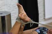Bikini lady Isabell hogtied