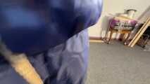 Lana bound and gagged in a shiny nylon Downvest