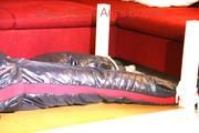 Mara tied and gagged on a bottom-up table wearing a supersexy black/red downwear combination (Pics)