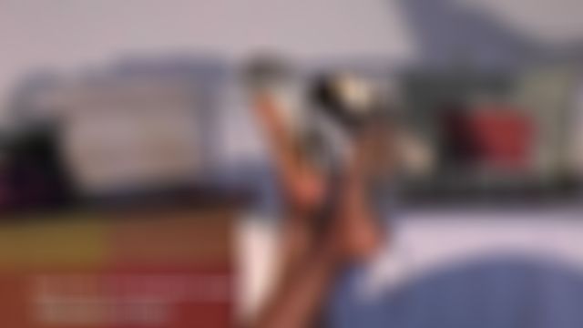 Strappy heels up in the air