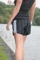 Enni outdoor wearing a sexy black shiny nylon shorts and a black top (Pics)
