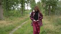 Miss Petra takes a walk in an AGU rain suit and rubber boots (looped version)