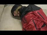 03:45 min. video with Shelly tied and gagged barefeet with shiny nylon rainwear in a cellar