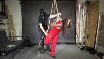 Marie bound, gagged and suspended in a shiny nylon Jumpsuit